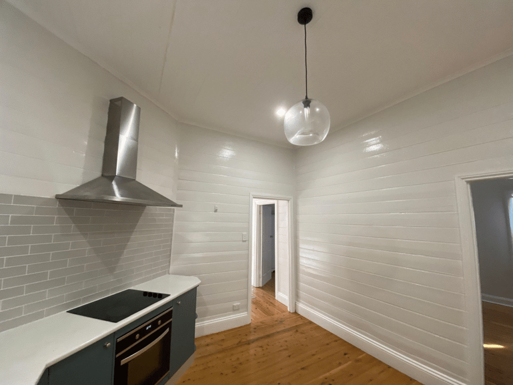 a freshly painted kitchen in Mayfield in off white.